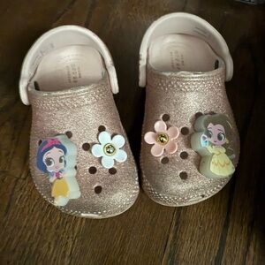 CROCS Kids Glittery Pink Slippers with Princess Charms